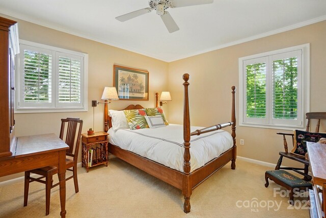 308 Odell St, Kannapolis, NC 28083 - bedroom featuring light colored carpet, crown molding, a ceiling fan, and baseboards