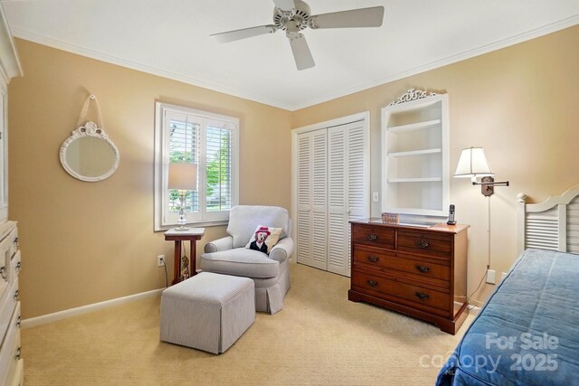 308 Odell St, Kannapolis, NC 28083 - bedroom featuring light carpet, ornamental molding, a closet, a ceiling fan, and baseboards