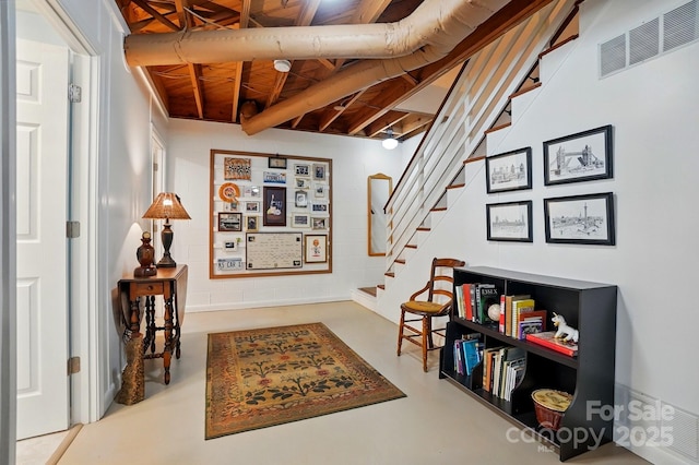 308 Odell St, Kannapolis, NC 28083 - interior space featuring stairway, concrete flooring, and beamed ceiling