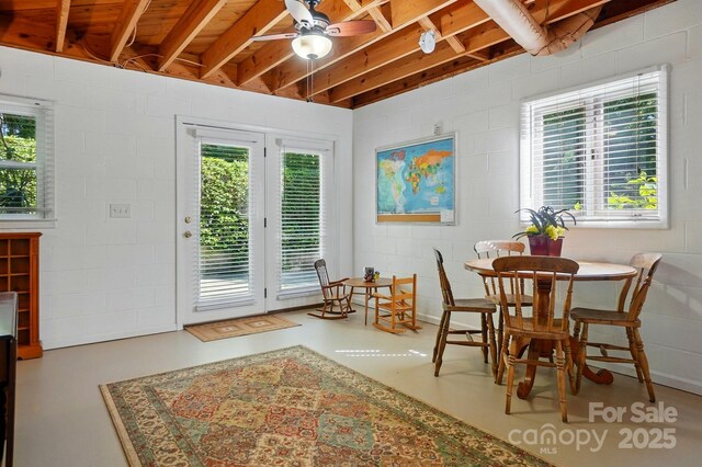 308 Odell St, Kannapolis, NC 28083 - dining space with ceiling fan and concrete block wall