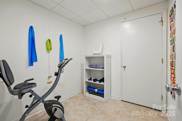 308 Odell St, Kannapolis, NC 28083 - workout area featuring a paneled ceiling and baseboards