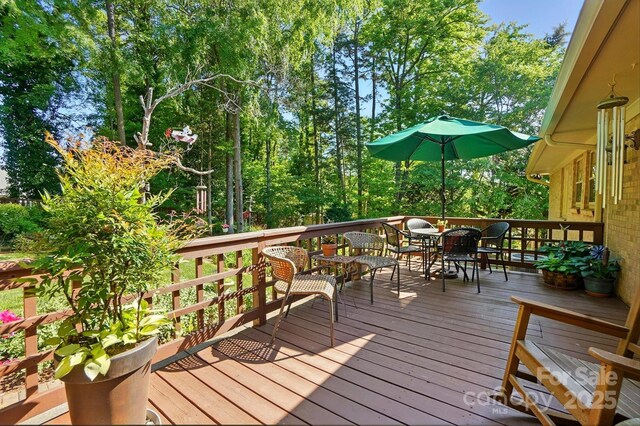 308 Odell St, Kannapolis, NC 28083 - wooden deck with outdoor dining area