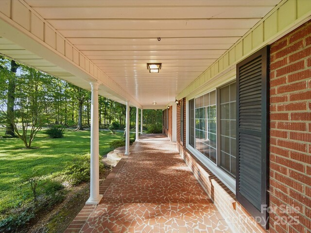 2216 Griffith Rd, Monroe, NC 28112 - covered porch with a yard