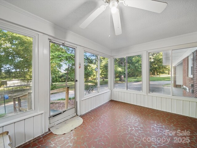 2216 Griffith Rd, Monroe, NC 28112 - unfurnished sunroom featuring ceiling fan