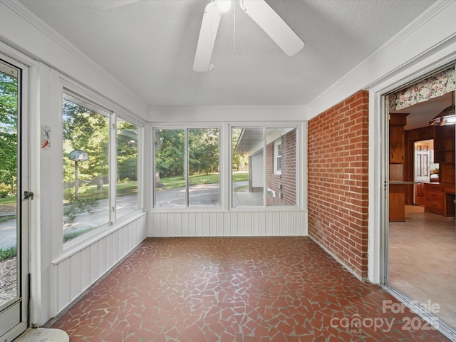 2216 Griffith Rd, Monroe, NC 28112 - unfurnished sunroom featuring ceiling fan and plenty of natural light