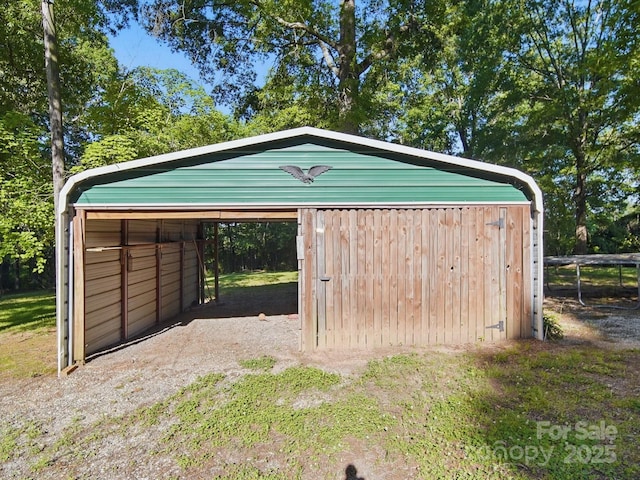 2216 Griffith Rd, Monroe, NC 28112 - garage with a detached carport