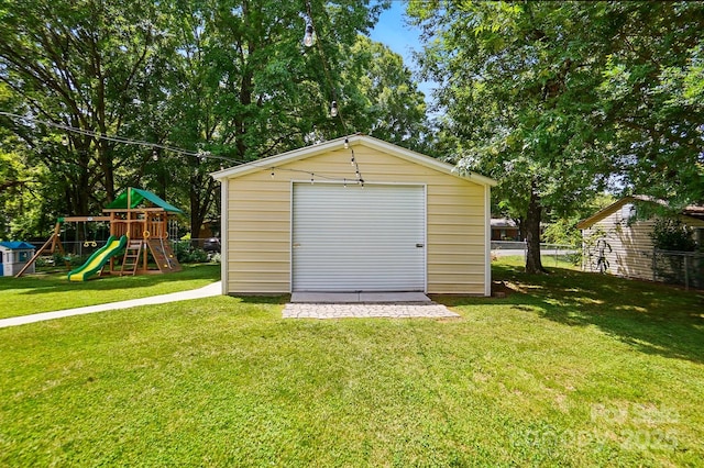 103 W Sunset Dr, Locust, NC 28097 - garage featuring a storage shed