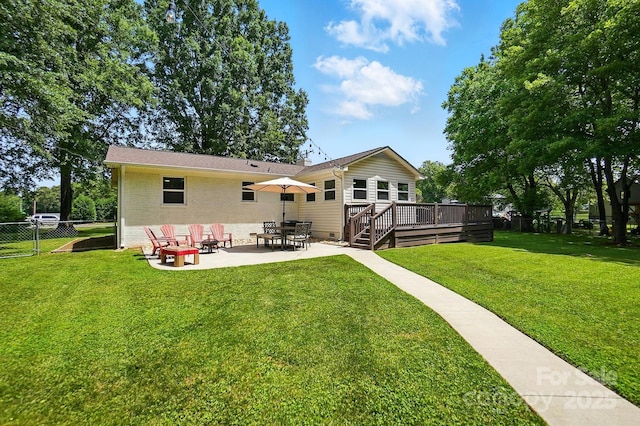 103 W Sunset Dr, Locust, NC 28097 - back of house with a deck, a patio, brick siding, and crawl space