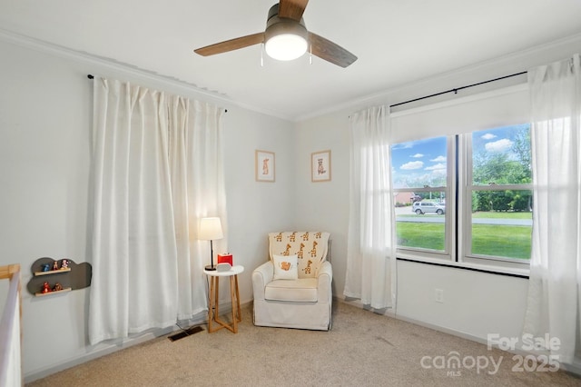 103 W Sunset Dr, Locust, NC 28097 - sitting room featuring crown molding, ceiling fan, carpet floors, and baseboards