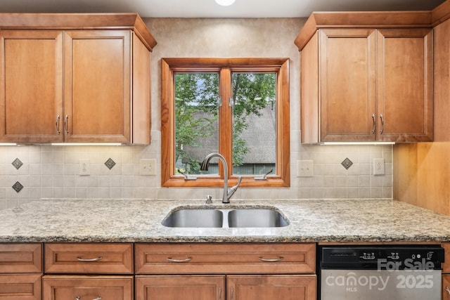 8117 Rising Meadow Rd, Charlotte, NC 28277 - kitchen with a sink, dishwasher, light stone countertops, and backsplash