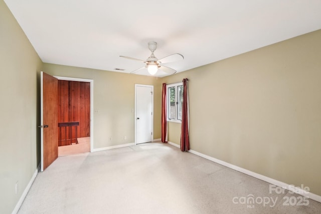 8117 Rising Meadow Rd, Charlotte, NC 28277 - unfurnished bedroom featuring baseboards and a ceiling fan