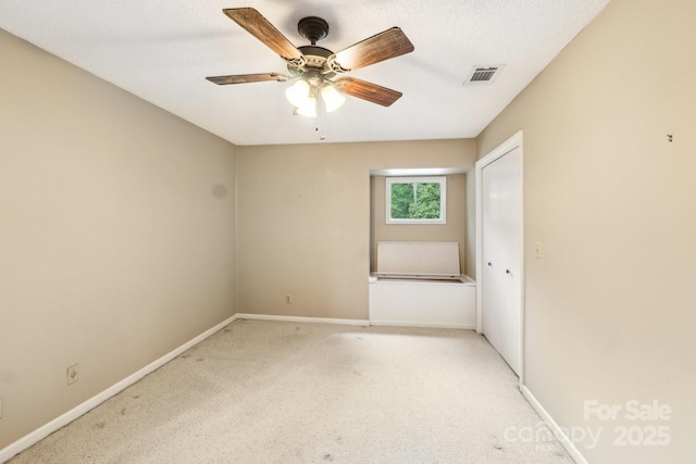 8117 Rising Meadow Rd, Charlotte, NC 28277 - spare room with ceiling fan, baseboards, and light colored carpet