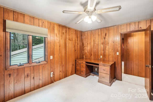 8117 Rising Meadow Rd, Charlotte, NC 28277 - unfurnished office with carpet flooring, ceiling fan, and wooden walls