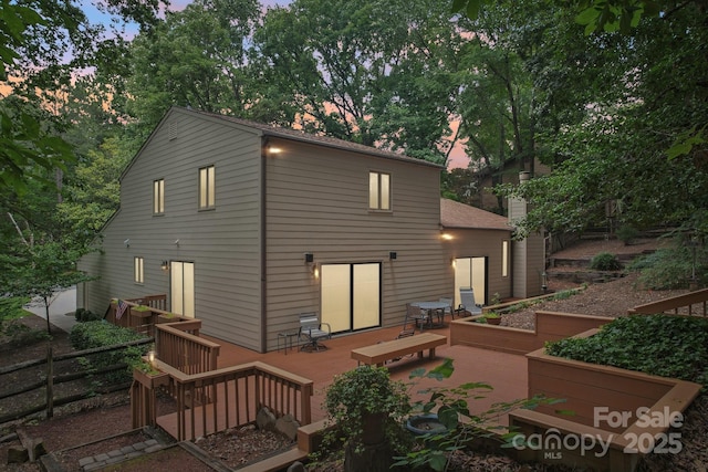8117 Rising Meadow Rd, Charlotte, NC 28277 - rear view of house featuring a deck