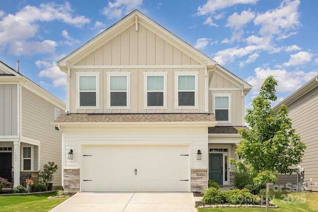 16018 River Tree Ln, Charlotte, NC 28278 - craftsman inspired home with board and batten siding, a shingled roof, a garage, driveway, and stone siding