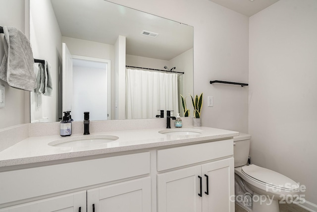 16018 River Tree Ln, Charlotte, NC 28278 - full bathroom featuring double vanity and toilet