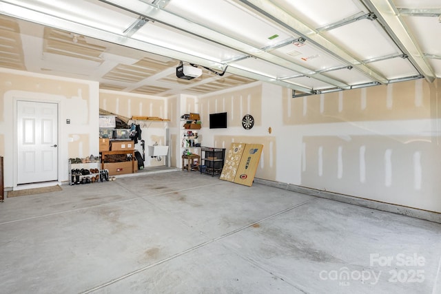 16018 River Tree Ln, Charlotte, NC 28278 - garage featuring a garage door opener