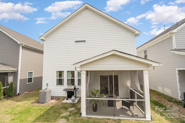 16018 River Tree Ln, Charlotte, NC 28278 - back of house featuring central AC unit and a sunroom