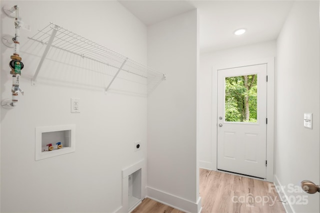 212 N Correll St, Landis, NC 28025 - laundry room with washer hookup, light wood-style flooring, electric dryer hookup, and baseboards