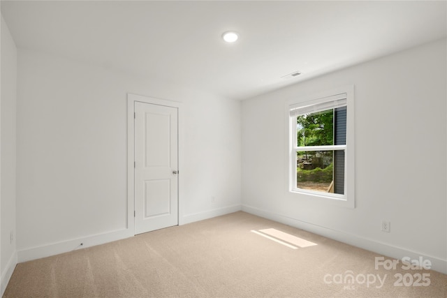 212 N Correll St, Landis, NC 28025 - unfurnished room featuring carpet flooring, baseboards, and recessed lighting