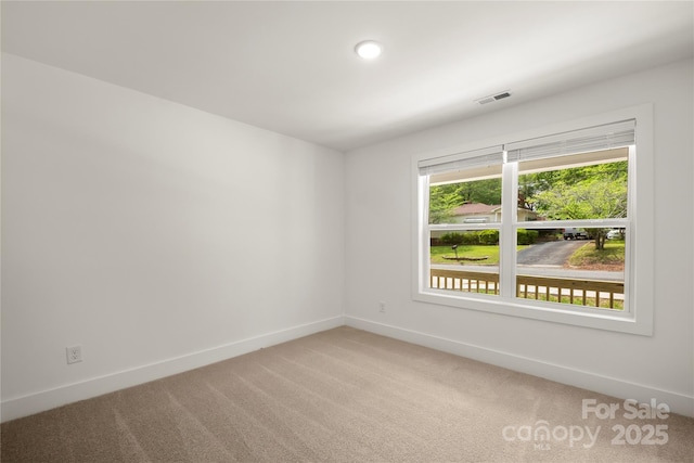 212 N Correll St, Landis, NC 28025 - unfurnished room featuring baseboards, carpet, and recessed lighting