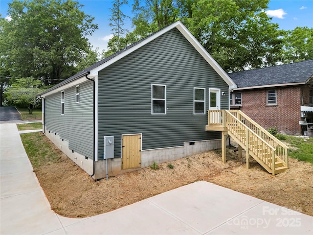212 N Correll St, Landis, NC 28025 - view of home's exterior featuring crawl space and a patio area