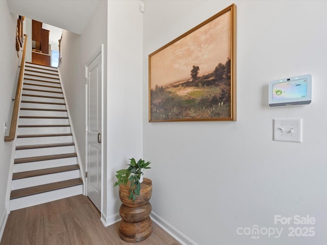 5508 Swaling St, Charlotte, NC 28217 - staircase with wood finished floors and baseboards