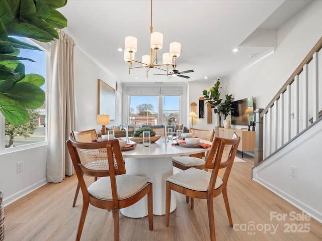 5508 Swaling St, Charlotte, NC 28217 - dining space featuring a chandelier, light wood-type flooring, stairway, recessed lighting, and ceiling fan