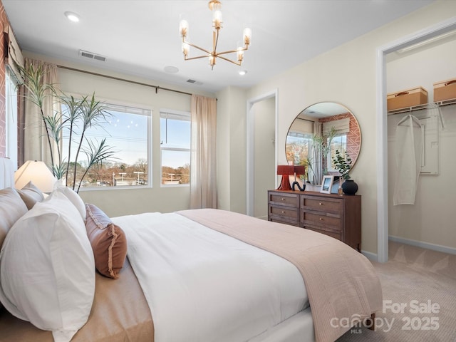 5508 Swaling St, Charlotte, NC 28217 - carpeted bedroom featuring a chandelier, recessed lighting, baseboards, and a spacious closet