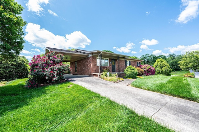 1515 Fairway Acres Rd, Lenoir, NC 28645 - ranch-style home featuring concrete driveway, brick siding, a front lawn, and an attached carport
