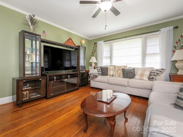 5629 Ruth Dr, Charlotte, NC 28215 - living area with crown molding, ceiling fan, and hardwood / wood-style flooring