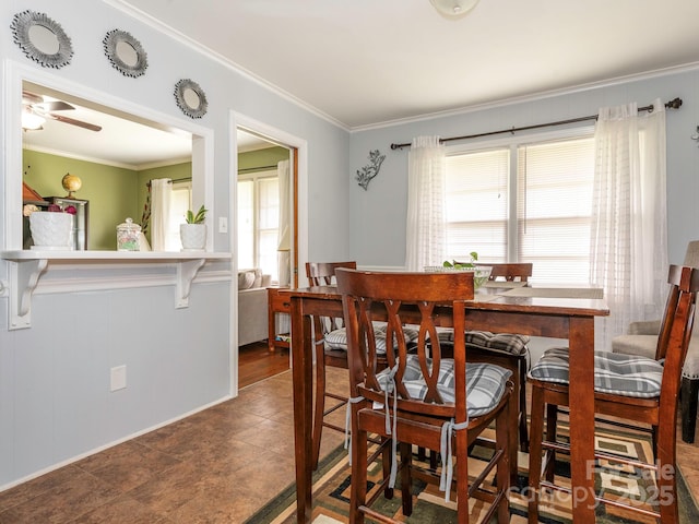 5629 Ruth Dr, Charlotte, NC 28215 - dining area with crown molding and a ceiling fan