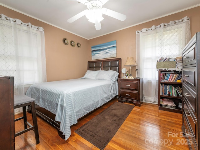 5629 Ruth Dr, Charlotte, NC 28215 - bedroom with hardwood / wood-style floors, crown molding, and ceiling fan