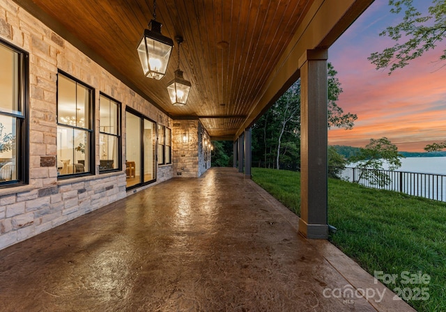 8066 Edgewater Dr Unit 103, Norwood, NC 28128 - view of patio / terrace featuring a water view