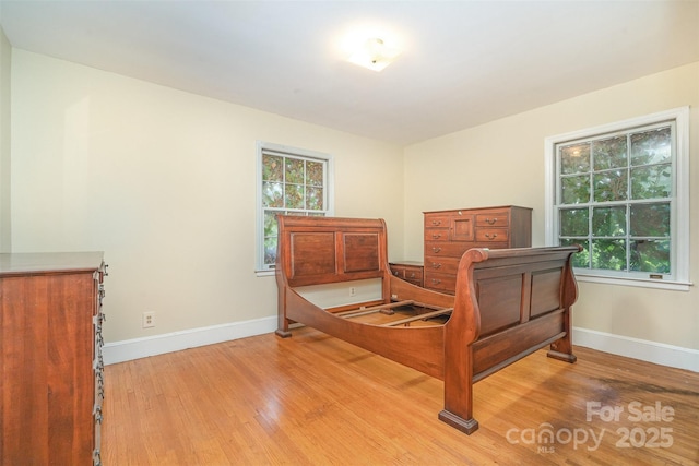 3526 Craig Ave, Charlotte, NC 28211 - bedroom featuring wood finished floors and baseboards