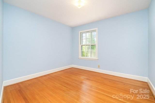 3526 Craig Ave, Charlotte, NC 28211 - unfurnished room with baseboards and light wood finished floors