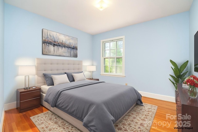 3526 Craig Ave, Charlotte, NC 28211 - bedroom featuring baseboards and light wood-style floors