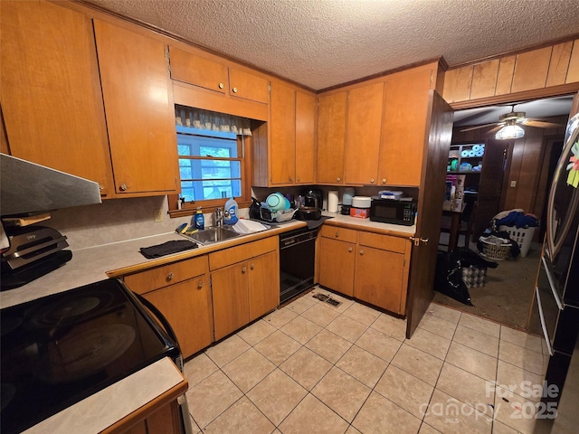116 E Graves St, Candor, NC 27229 - kitchen featuring black appliances, light countertops, light tile patterned flooring, a textured ceiling, and a ceiling fan