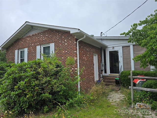 116 E Graves St, Candor, NC 27229 - view of side of property with entry steps and brick siding