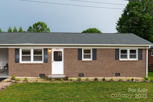 ranch-style home featuring crawl space, a front lawn, and brick siding