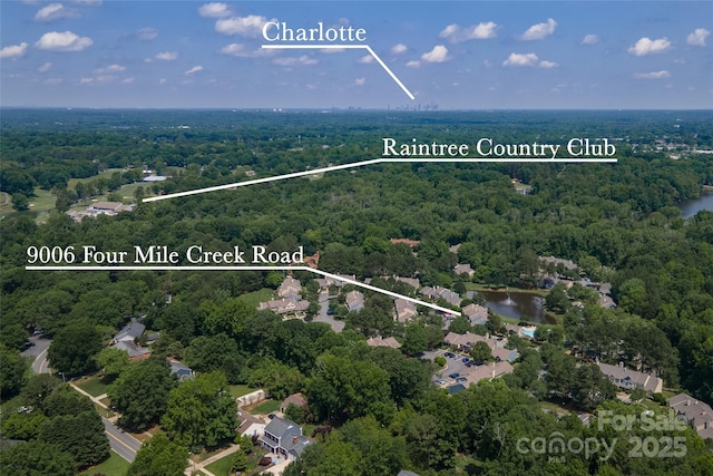9006 Four Mile Creek Rd, Charlotte, NC 28277 - aerial overview of property's location with a heavily wooded area, property parcel outlined, and a nearby body of water