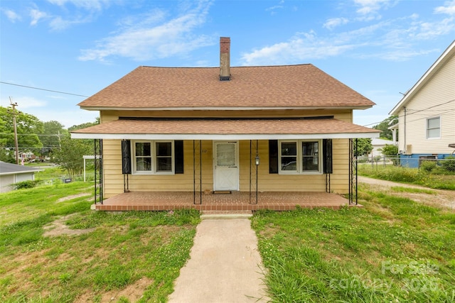 217 S Highland St, Gastonia, NC 28052 - bungalow-style house with a shingled roof and a porch