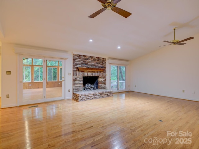 8 Sunrise Point Rd, Lake Wylie, SC 29710 - unfurnished living room featuring a ceiling fan, vaulted ceiling, wood finished floors, baseboards, and recessed lighting