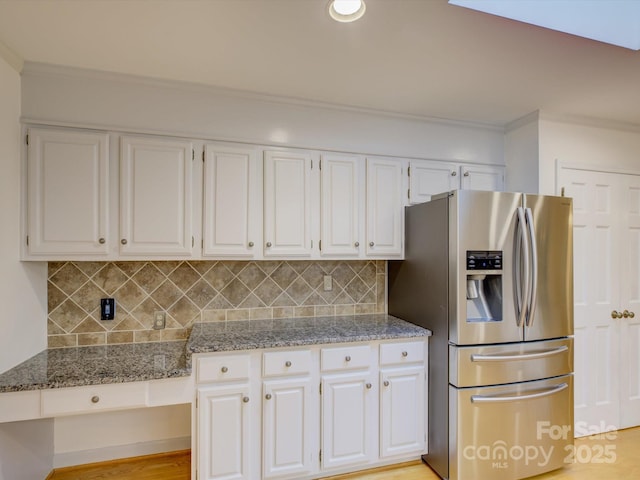 8 Sunrise Point Rd, Lake Wylie, SC 29710 - kitchen featuring stainless steel fridge, white cabinetry, ornamental molding, decorative backsplash, and stone countertops