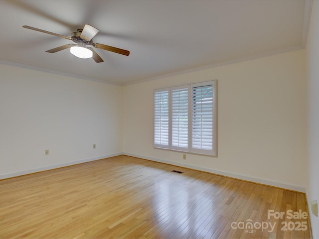 8 Sunrise Point Rd, Lake Wylie, SC 29710 - unfurnished room with light wood-style flooring, crown molding, baseboards, and ceiling fan
