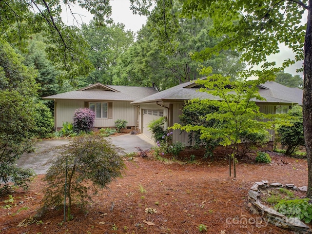 8 Sunrise Point Rd, Lake Wylie, SC 29710 - view of front facade featuring an attached garage, concrete driveway, and roof with shingles