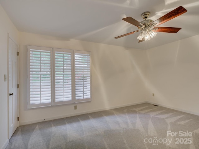 8 Sunrise Point Rd, Lake Wylie, SC 29710 - carpeted spare room featuring baseboards and a ceiling fan