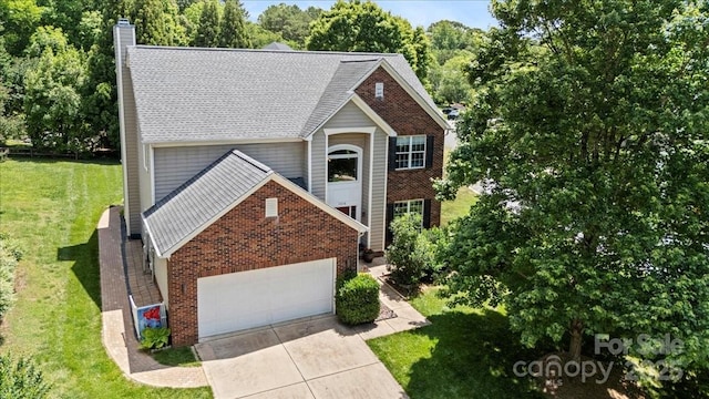 16018 Hollingbourne Rd, Huntersville, NC 28078 - traditional-style home featuring a chimney, brick siding, a front lawn, an attached garage, and a shingled roof