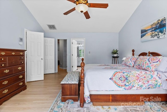 16018 Hollingbourne Rd, Huntersville, NC 28078 - bedroom with vaulted ceiling, light wood finished floors, and a ceiling fan