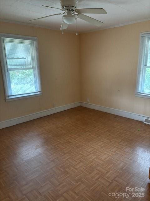 8000 Chapman St, Charlotte, NC 28216 - unfurnished room with a ceiling fan, baseboards, and crown molding